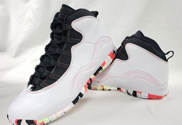 This Air Jordan 10 For Kids Features  Camo Style Soles 